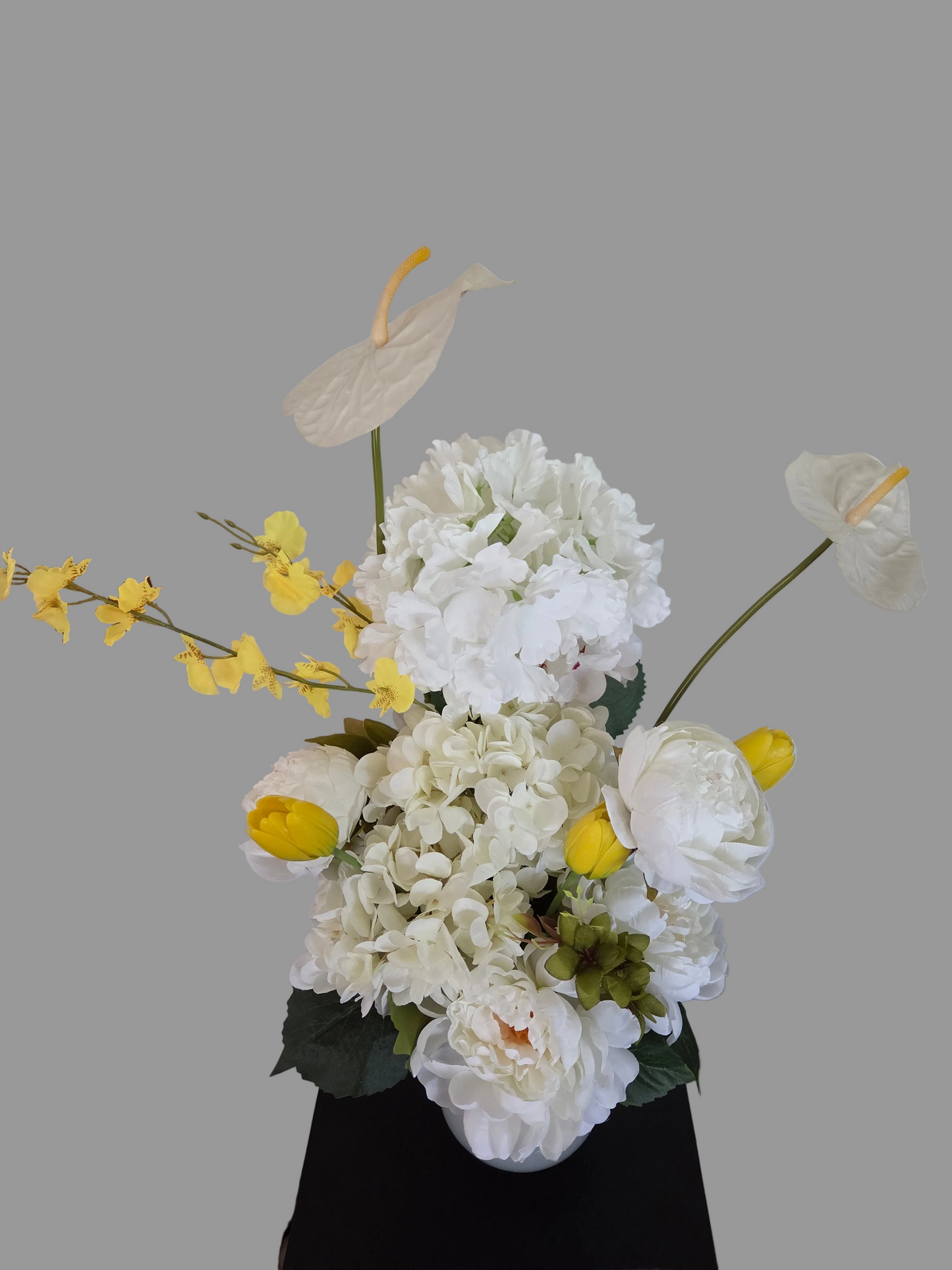 Golden dancing lady orchids,  tulips creamy anthuriums  blooms